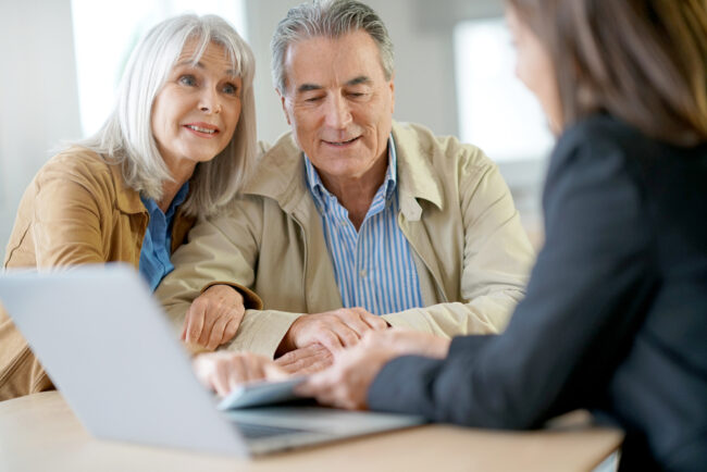 Senior,Couple,Meeting,Financial,Adviser,For,Investment