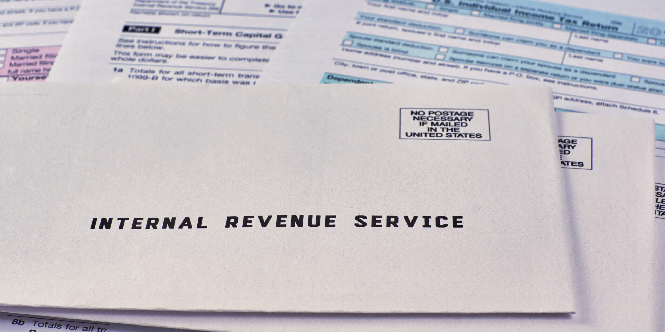 Three,Mails,From,The,Internal,Revenue,Service,Lie,On,1040,