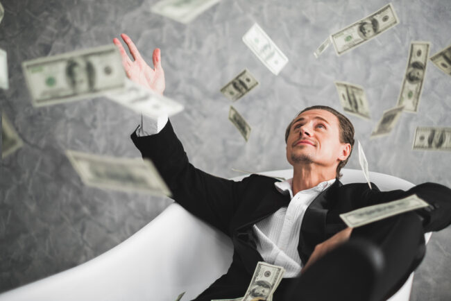 Business,Man,,Rich,,Millionaire,,Billionaire,,With,Many,Banknote,Dollars,Money
