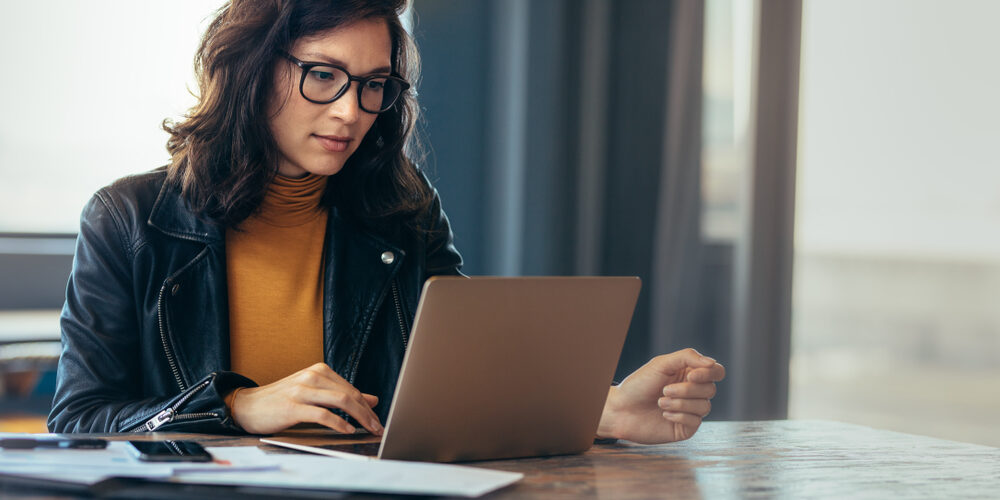 Asian,Woman,Working,Laptop.,Business,Woman,Busy,Working,On,Laptop